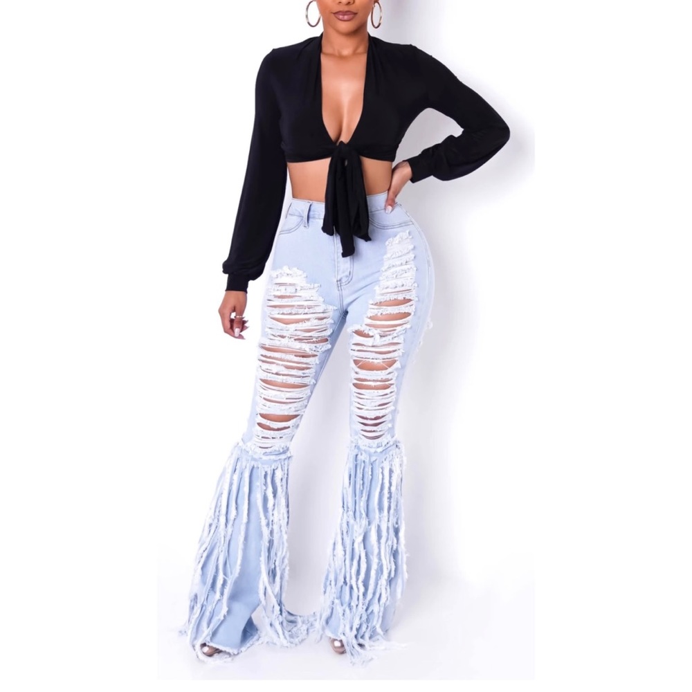 Destroyed flare leg jeans